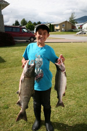 Myles Pedro with his catch of chum and pink